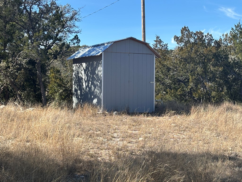 2043 Sd 45670 Rocksprings, TX 78880 - Photo 5 of 44 a backyard of a house with lots of green space