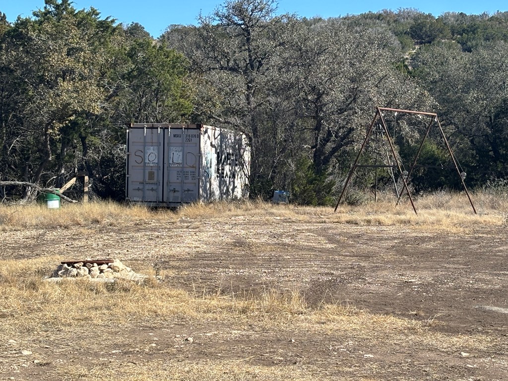 2043 Sd 45670 Rocksprings, TX 78880 - Photo 7 of 44 a view of a yard covered with snow in front of house