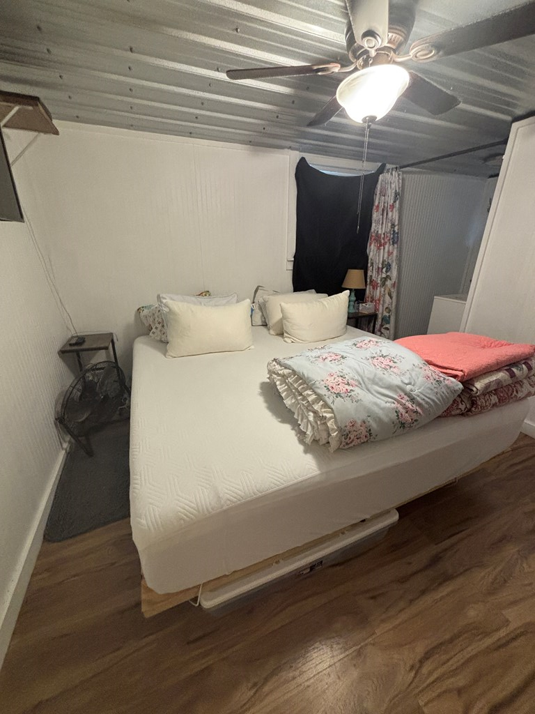 2043 Sd 45670 Rocksprings, TX 78880 - Photo 9 of 44 a bedroom with a bed and wooden floor