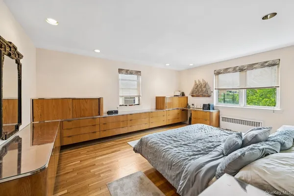 a living room with furniture rug and window