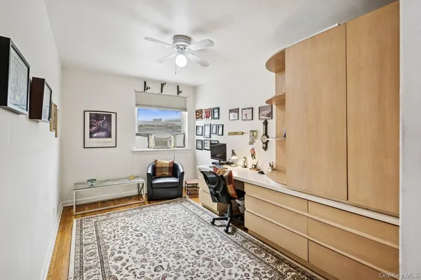 a living room with furniture and flat screen tv