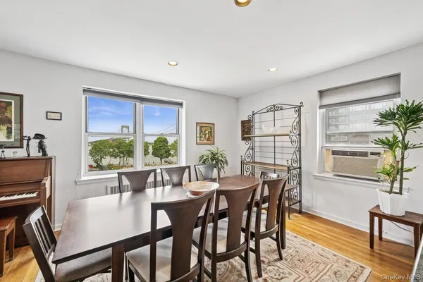 a view of a dining room with furniture window and outside view