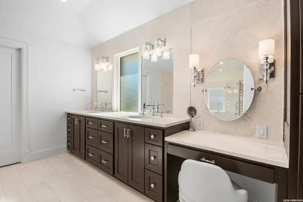 a view of kitchen with a sink and cabinets