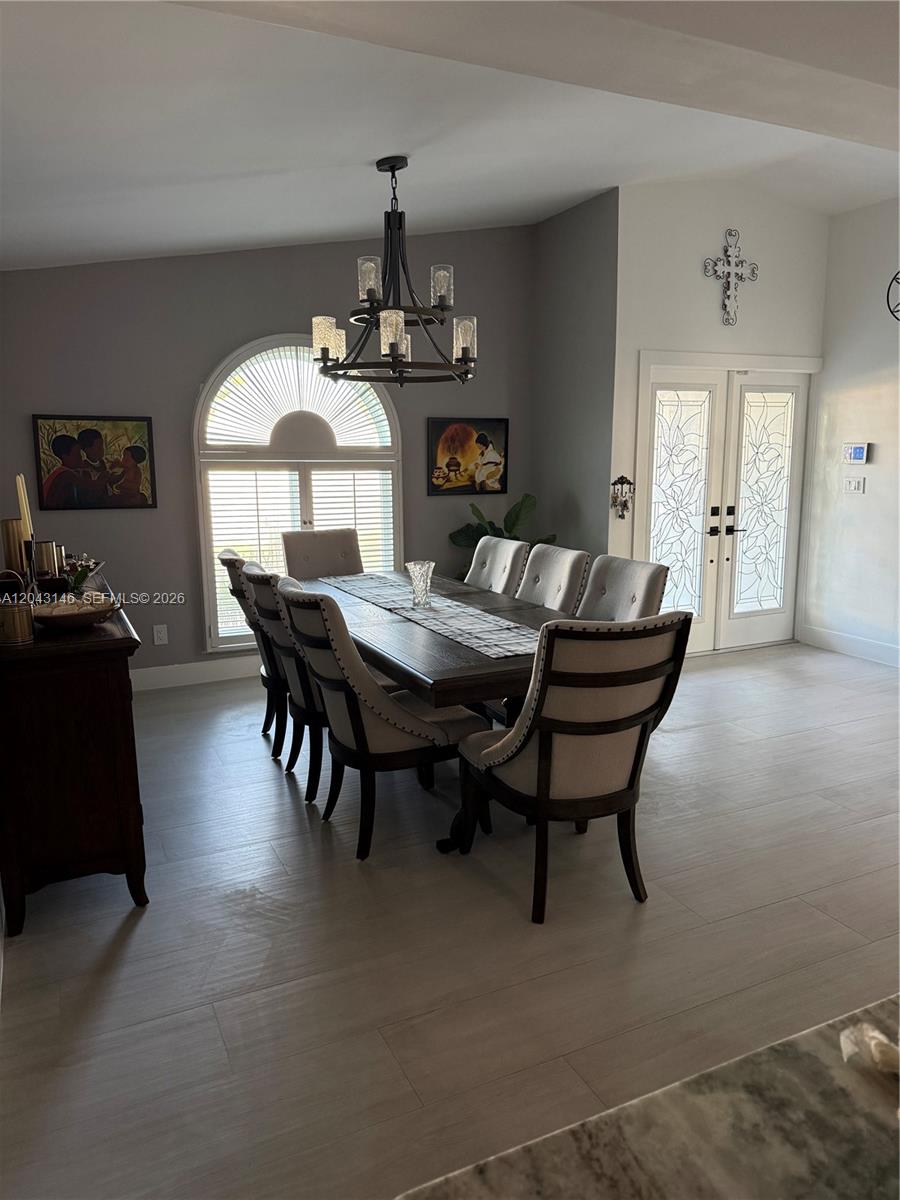 4947 Southwest 143rd Avenue Miami, FL 33175 - Photo 7 of 19 View of dining room area and house entrance.