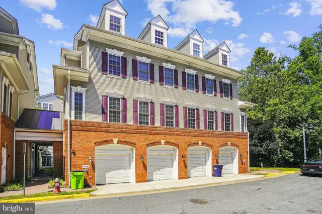 a front view of a multi story residential apartment building