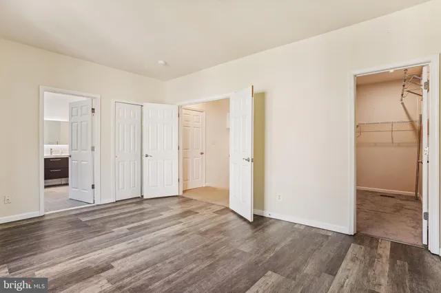 a view of a house with swimming pool and a yard