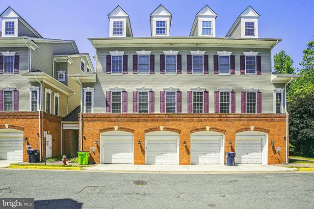 a front view of residential houses