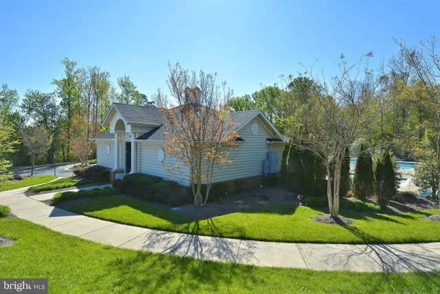 a view of swimming pool with a yard