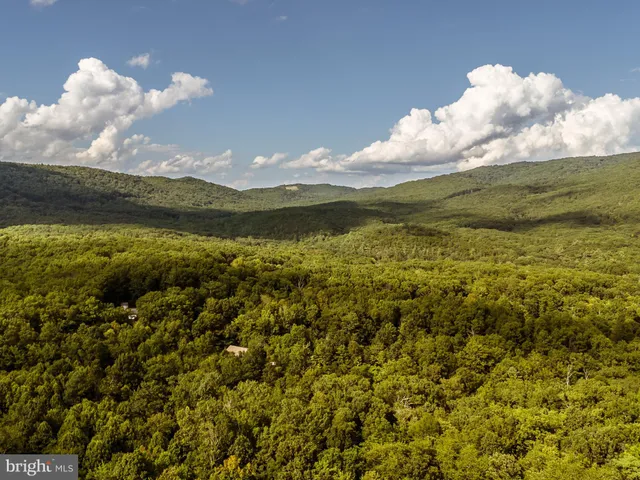 a view of lake with mountain