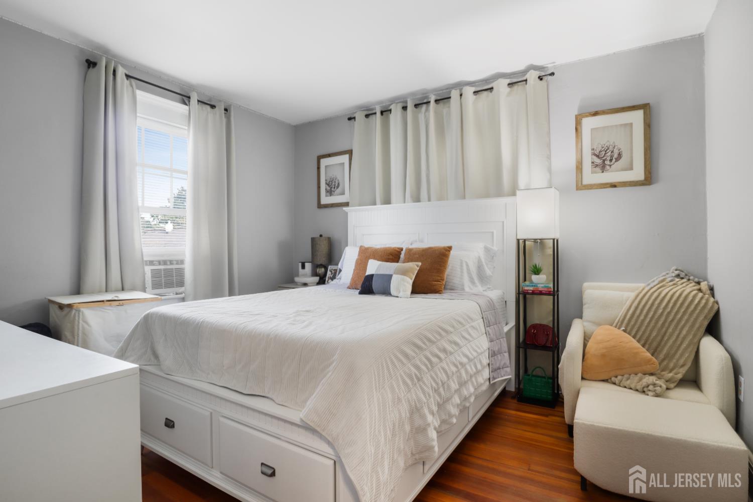 59 South 2nd Street Fords, NJ 08863 - Photo 16 of 37 a bed room with a bed and a couch