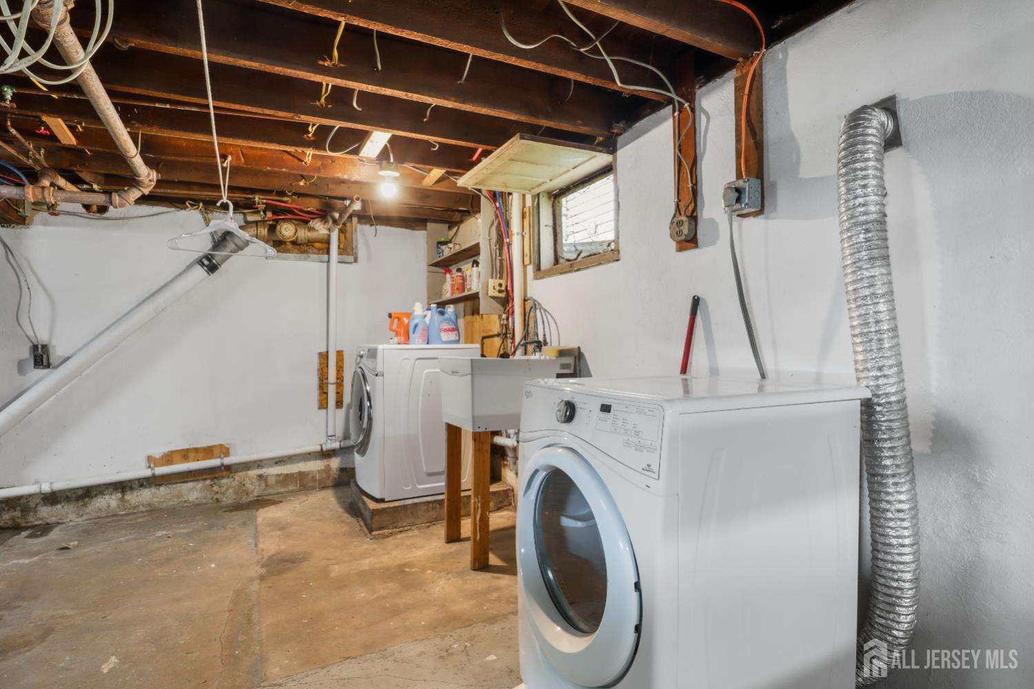 59 South 2nd Street Fords, NJ 08863 - Photo 21 of 37 a view of a storage & utility room with washer and dryer