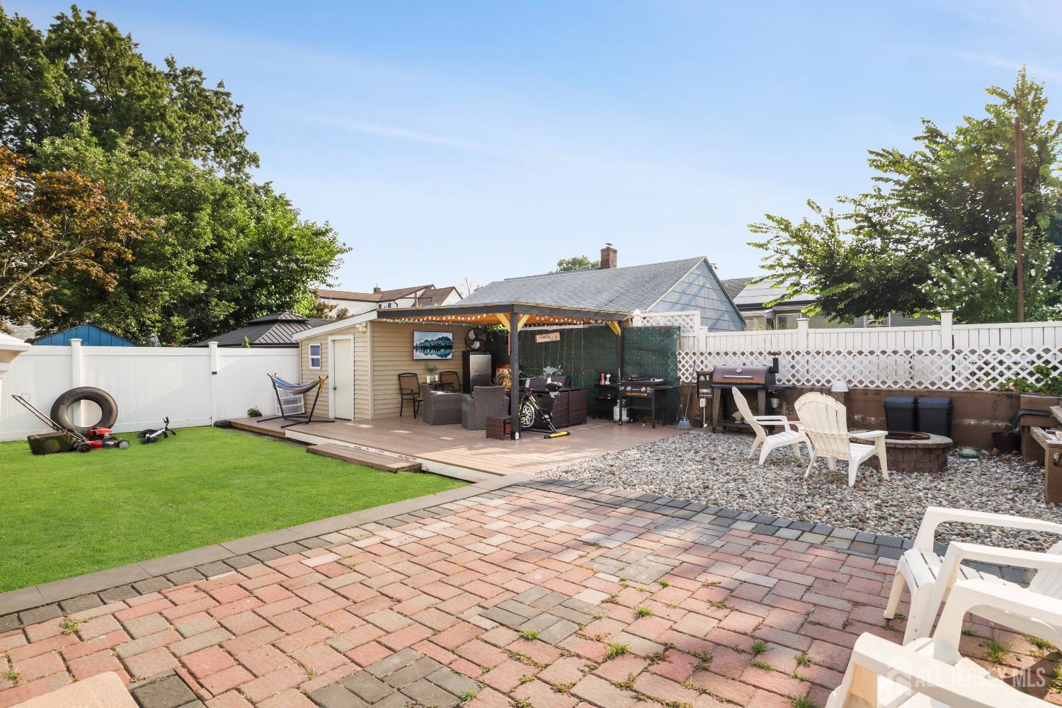 59 South 2nd Street Fords, NJ 08863 - Photo 25 of 37 a view of a patio with table and chairs near a yard