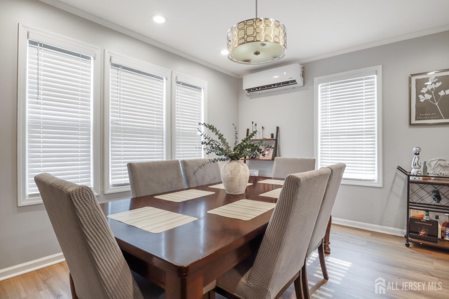 59 South 2nd Street Fords, NJ 08863 - Photo 10 of 37 a view of a dining room with furniture window and wooden floor