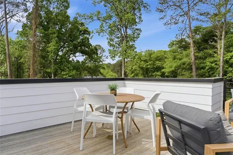 a view of chair and table in the terrace