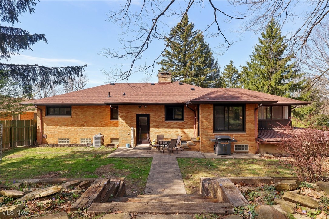 5809 West Ridgewood Drive Cleveland, OH 44129 - Photo 22 of 24 View of back of home. Home is all brick with a lovely patio and redesigned stairs.