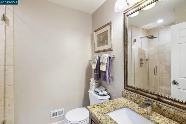 a view of storage and utility room with washer and dryer