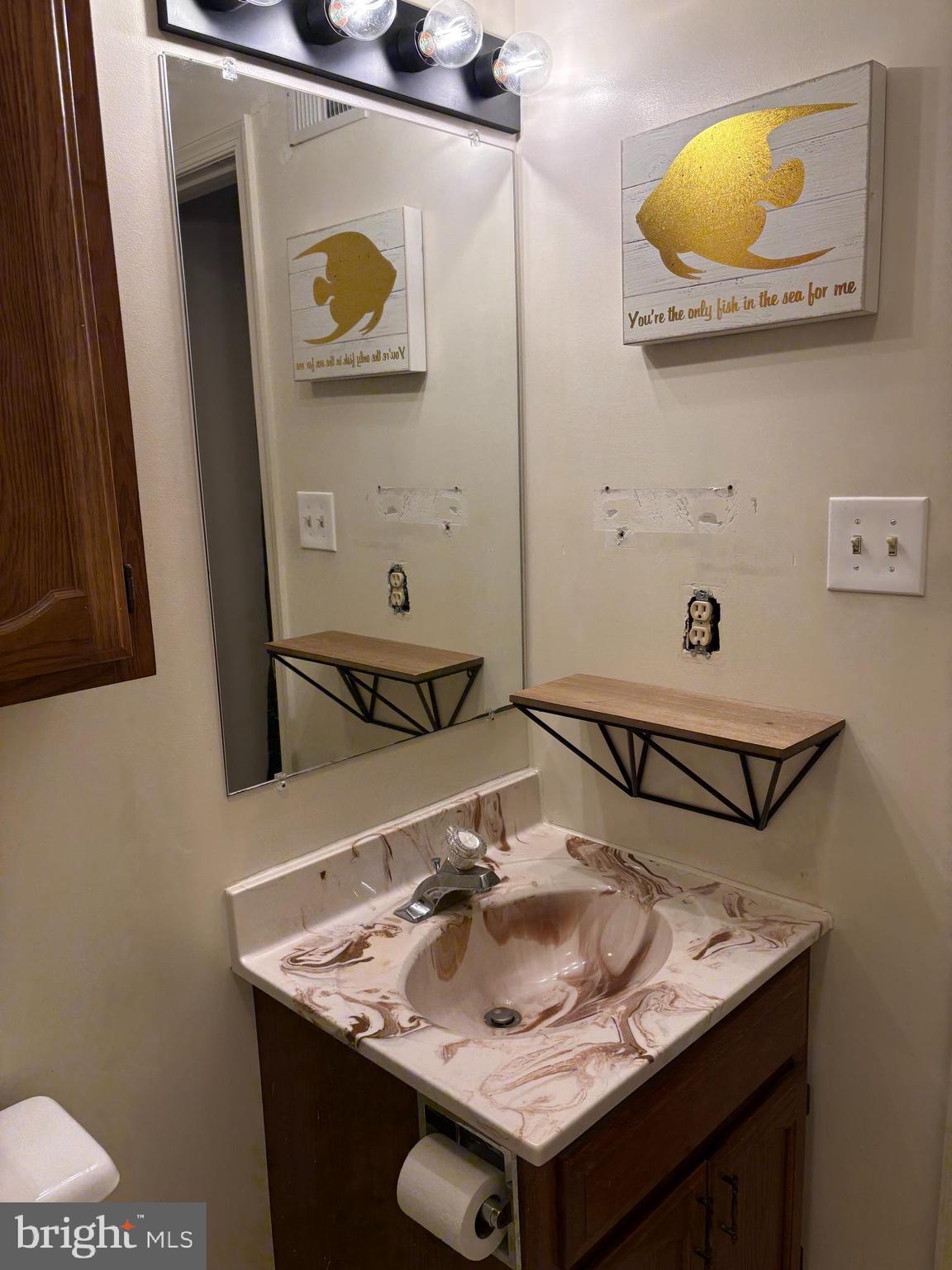 2865 Capon Springs Road High View, WV 26808 - Photo 12 of 34 a bathroom with a sink and a mirror
