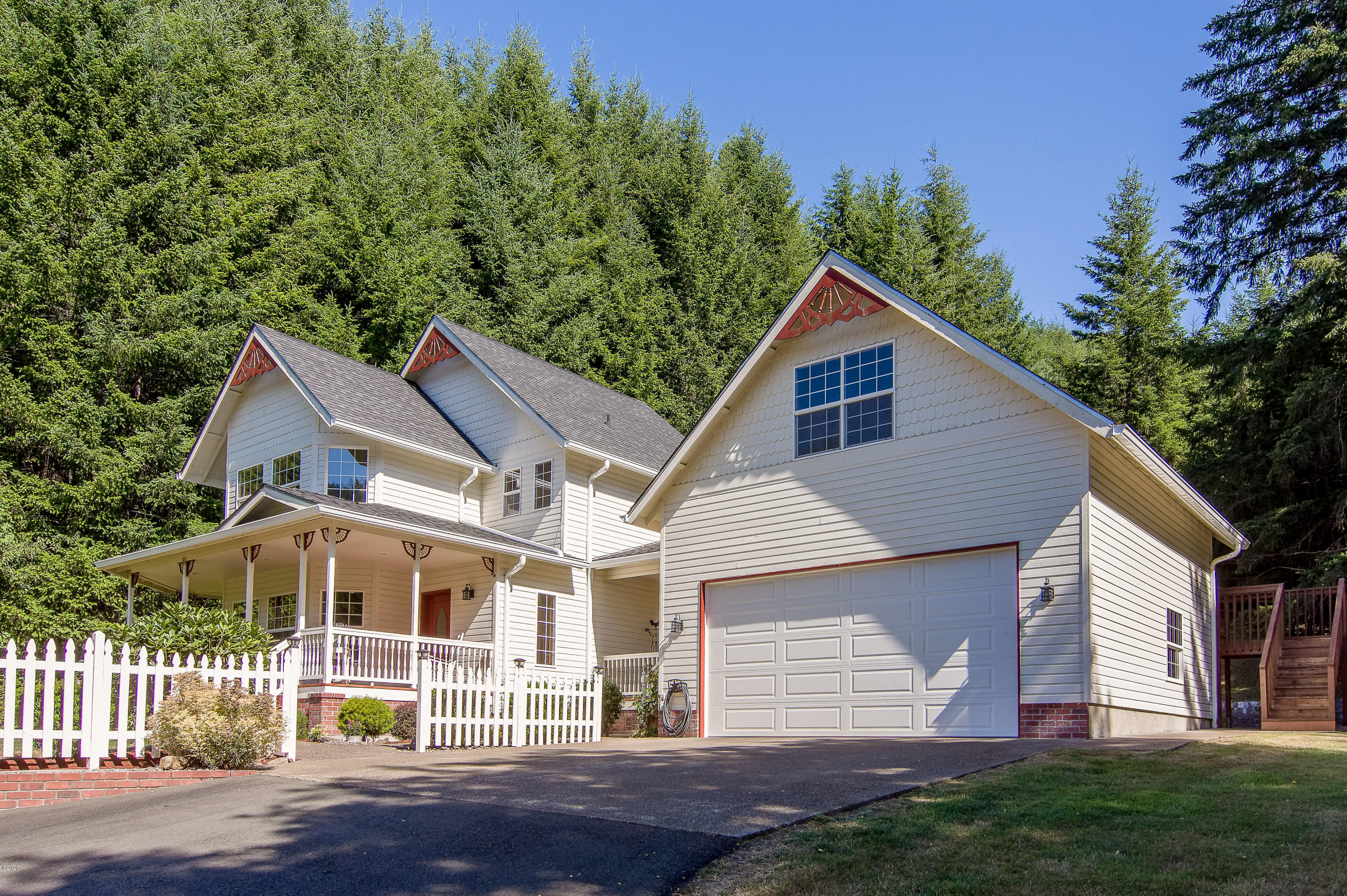 2536 Nashville Road Eddyville, OR 97343 - Photo 3 of 39 Side view of home with attached garage