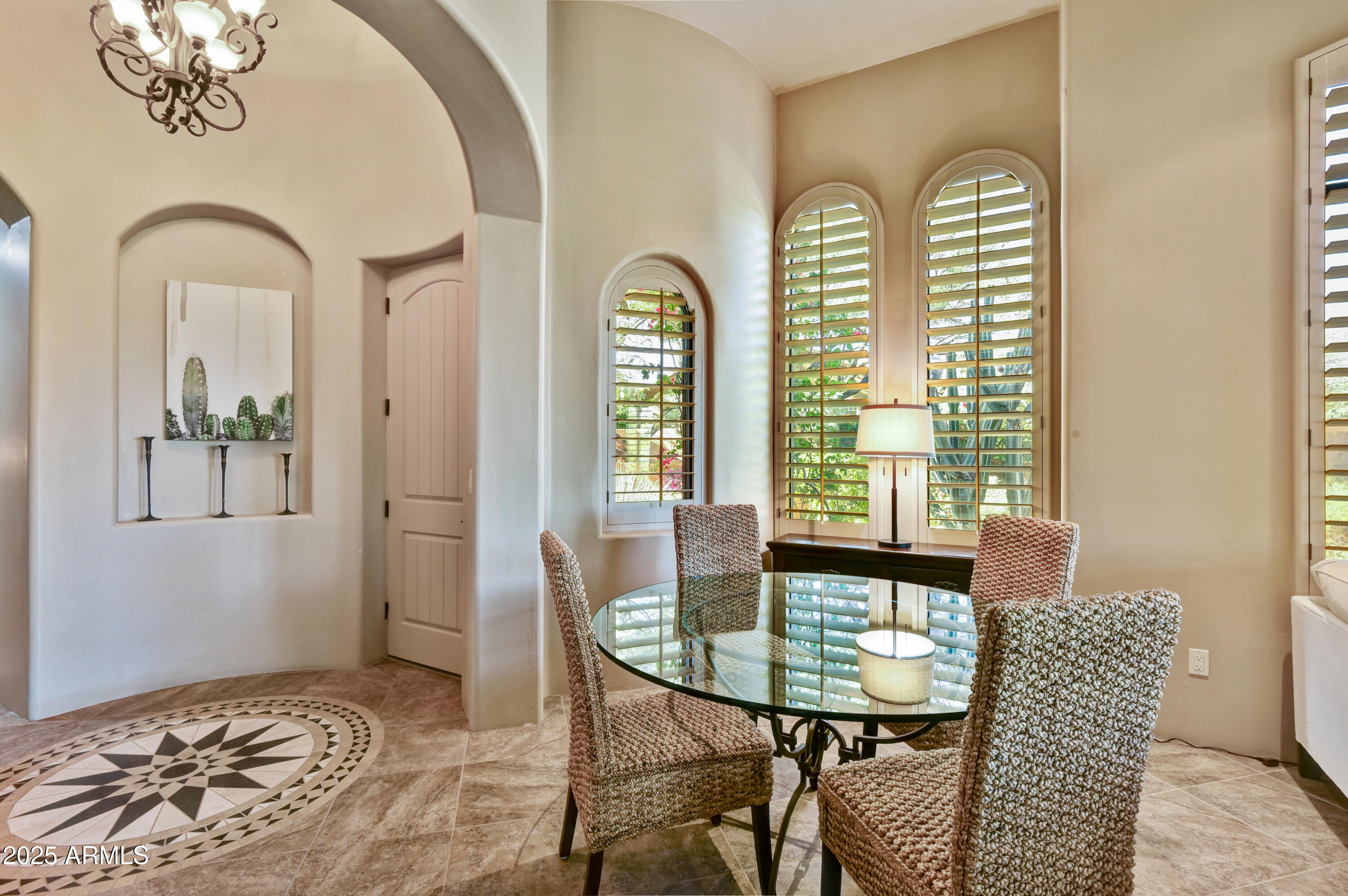 7199 East Ridgeview Place, Unit 100 Carefree, AZ 85377 - Photo 3 of 25 a view of a balcony with furniture and window