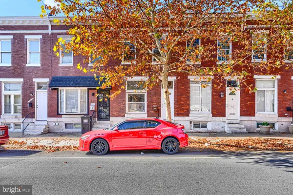 a car parked in front of a building