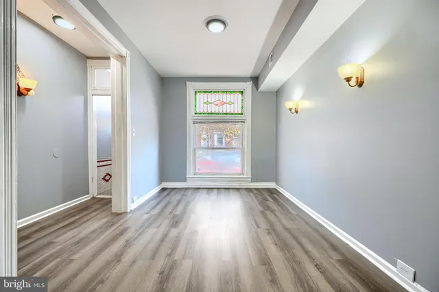 a view of an empty room and window