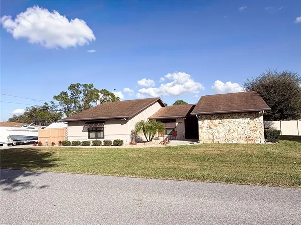 a view of a house with a big yard
