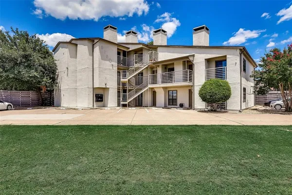 a front view of a house with yard