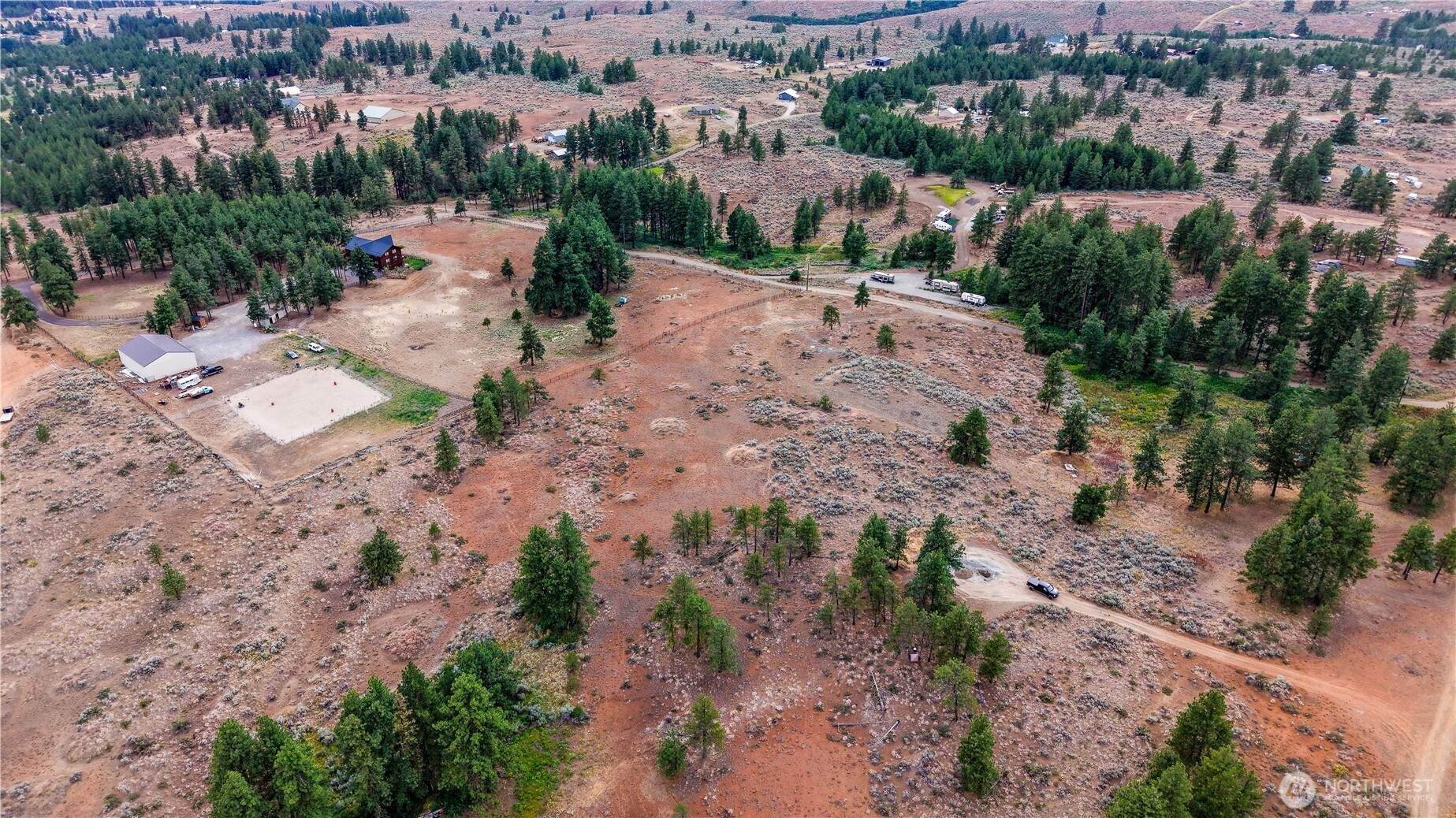 114 Falcon Ridge Road East Wenatchee, WA 98802 - Photo 2 of 7 an aerial view of a house with a yard