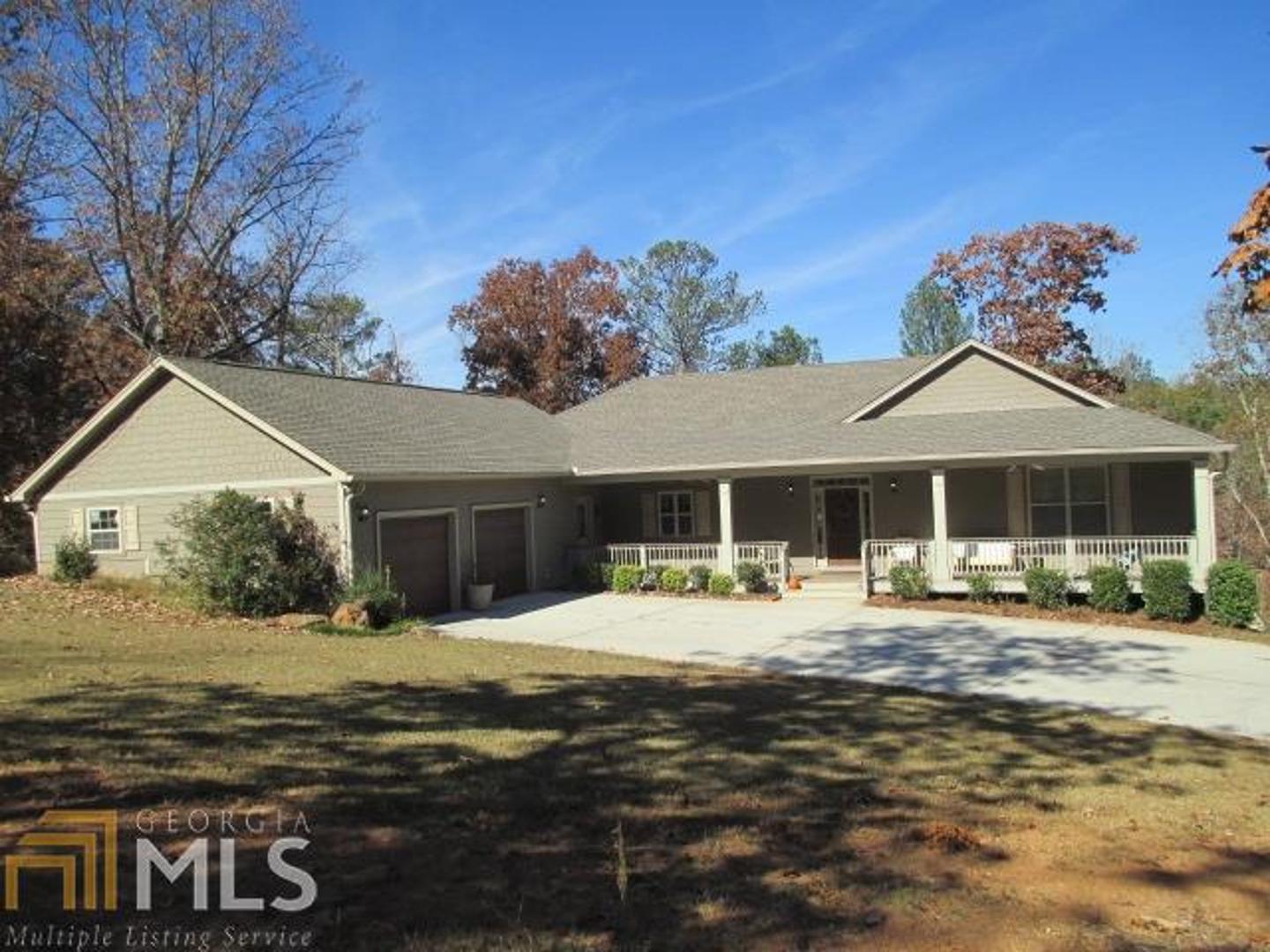9436 East Liberty Road, Unit 9 47AC Villa Rica, GA 30180 - Photo 1 of 1 a front view of a house with a yard