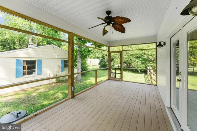 a view of porch with a floor to ceiling window