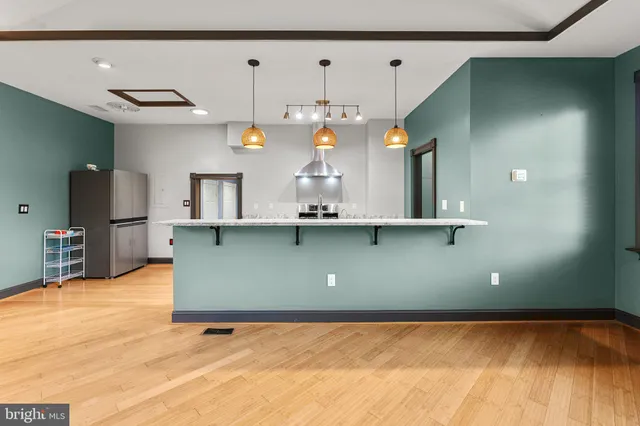 a view of livingroom with wooden floor