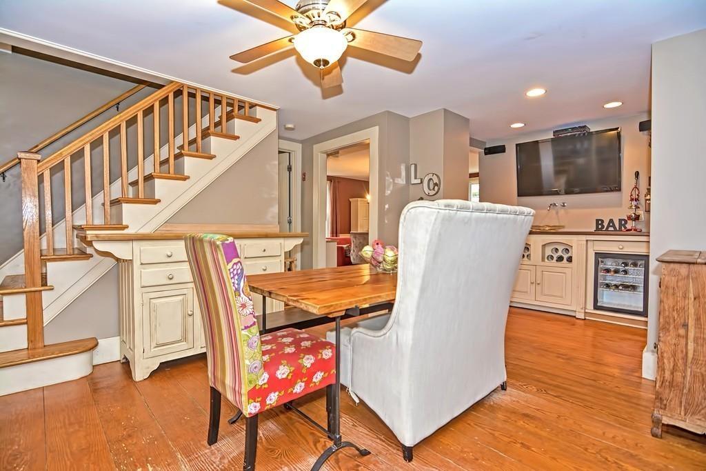 50 Warren Road Brimfield, MA 01010 - Photo 14 of 42 a dining room with furniture entryway and wooden floor
