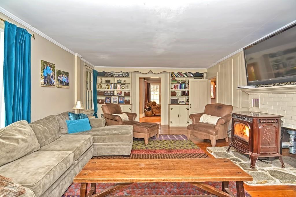 50 Warren Road Brimfield, MA 01010 - Photo 15 of 42 a living room with furniture large window and wooden floor