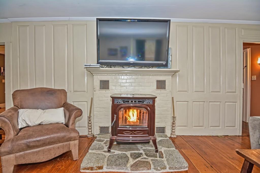 50 Warren Road Brimfield, MA 01010 - Photo 17 of 42 a living room with furniture and a fireplace