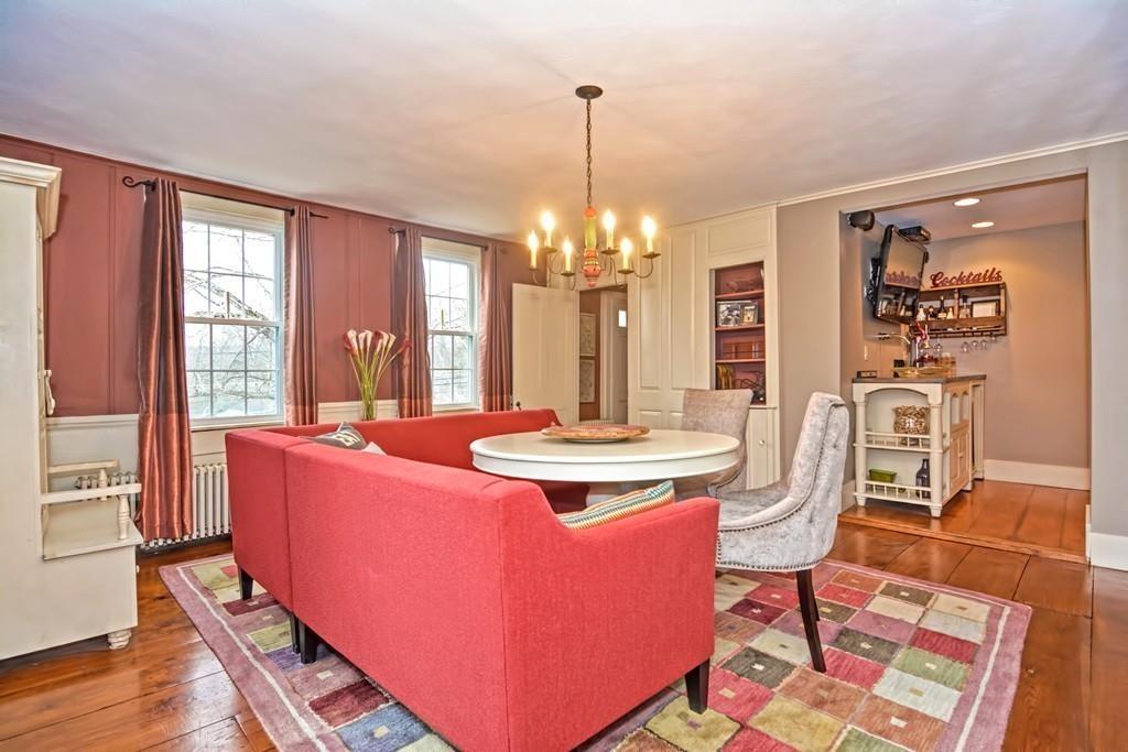 50 Warren Road Brimfield, MA 01010 - Photo 20 of 42 a view of a dining room with furniture and wooden floor