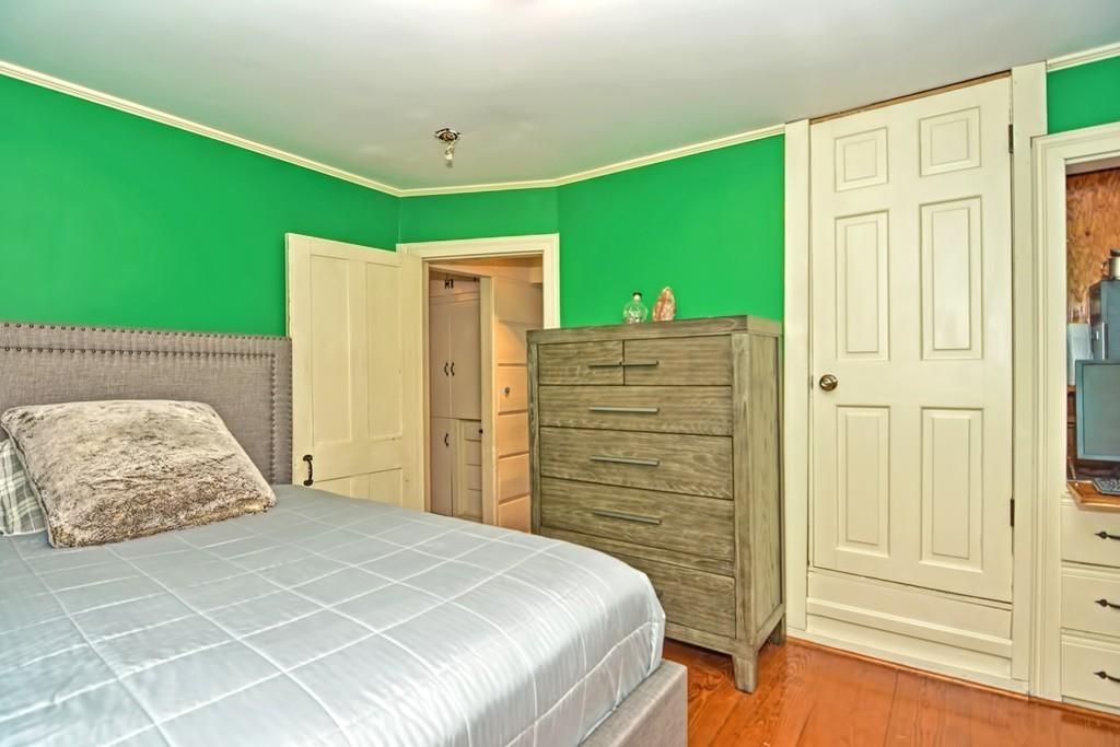 50 Warren Road Brimfield, MA 01010 - Photo 25 of 42 a bedroom with a bed and a dresser
