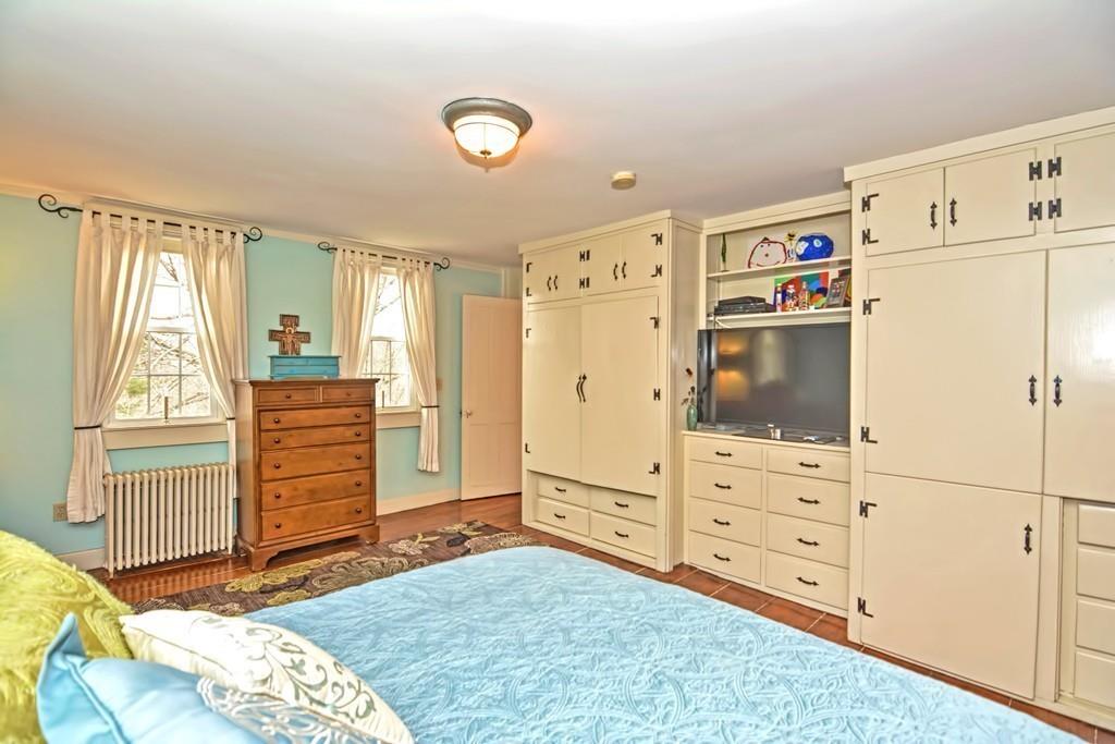 50 Warren Road Brimfield, MA 01010 - Photo 29 of 42 a bedroom with a dresser and a window