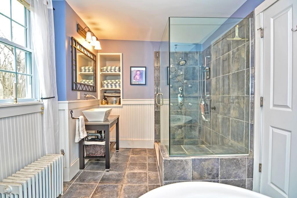 50 Warren Road Brimfield, MA 01010 - Photo 37 of 42 a bathroom with a bathtub and a shower
