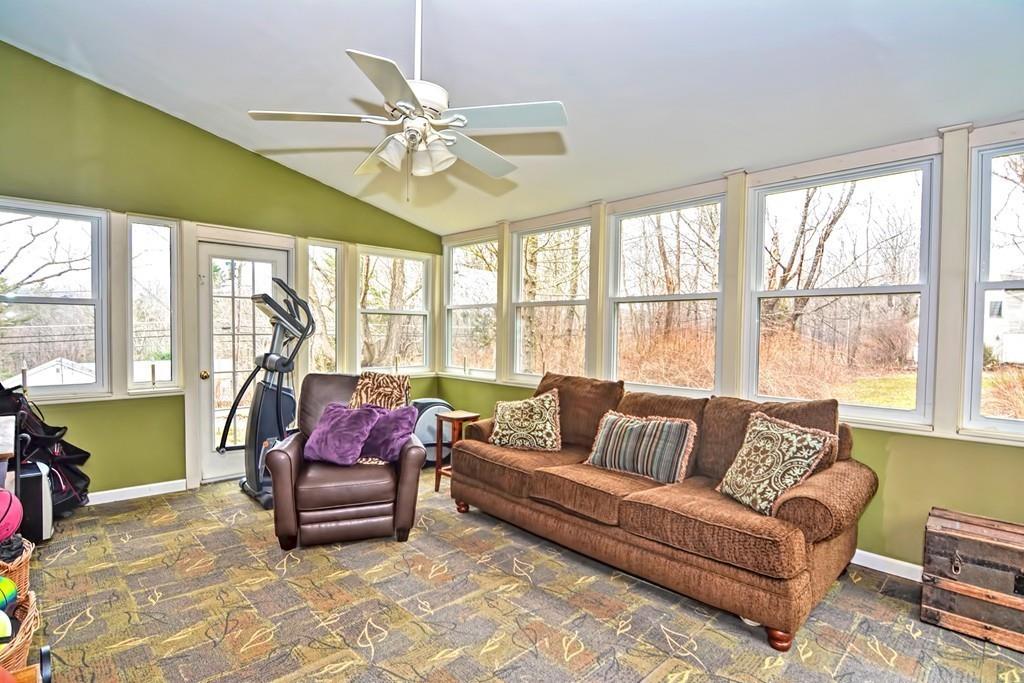50 Warren Road Brimfield, MA 01010 - Photo 40 of 42 a living room with furniture and a large window