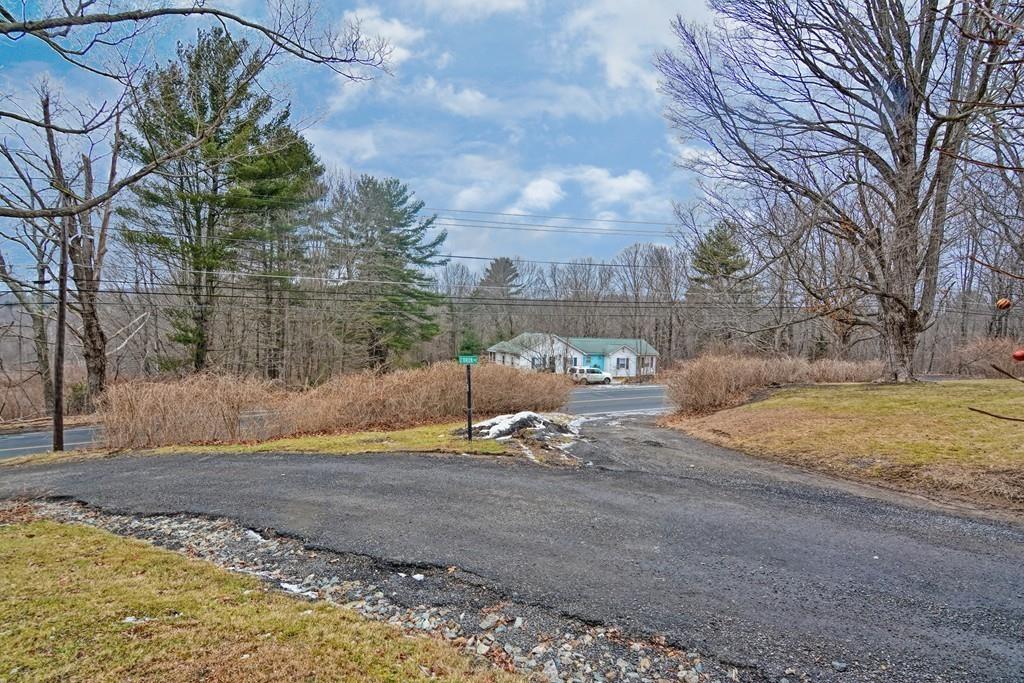 50 Warren Road Brimfield, MA 01010 - Photo 42 of 42 a view of a yard with a house