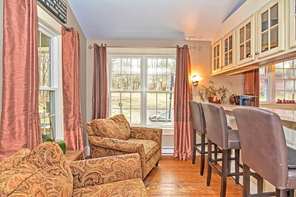 50 Warren Road Brimfield, MA 01010 - Photo 6 of 42 a living room with furniture and a floor to ceiling window