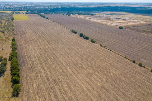 an aerial view of ocean and a space