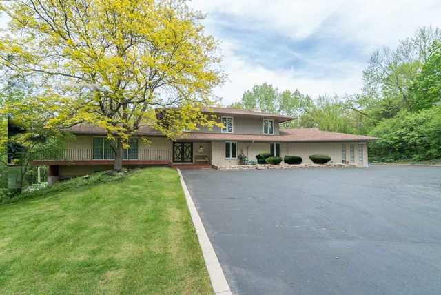 44 Old Creek Road Palos Park, IL 60464 - Photo 1 of 38 a view of a house with a yard and a large tree