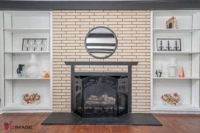 44 Old Creek Road Palos Park, IL 60464 - Photo 11 of 38 a room with a fireplace and wooden floor