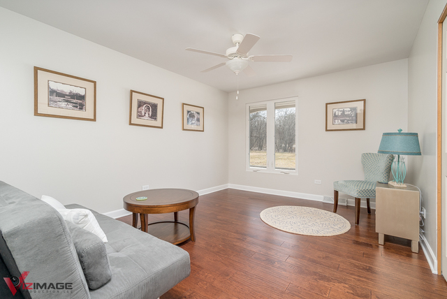 44 Old Creek Road Palos Park, IL 60464 - Photo 14 of 38 a living room with furniture and a wooden floor