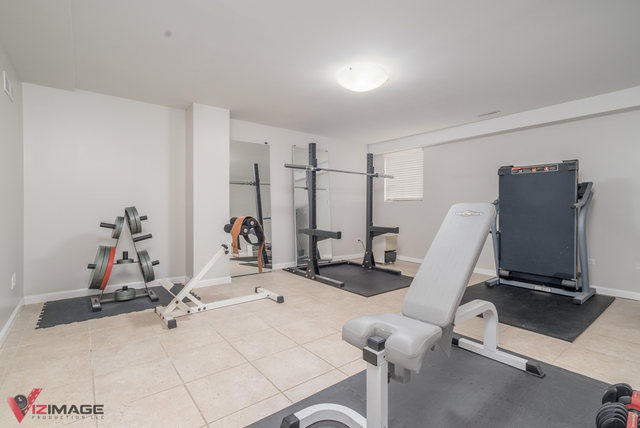 44 Old Creek Road Palos Park, IL 60464 - Photo 28 of 38 a view of a room with gym equipment