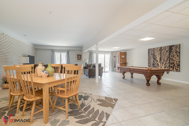 44 Old Creek Road Palos Park, IL 60464 - Photo 29 of 38 a living room with furniture a table and chairs
