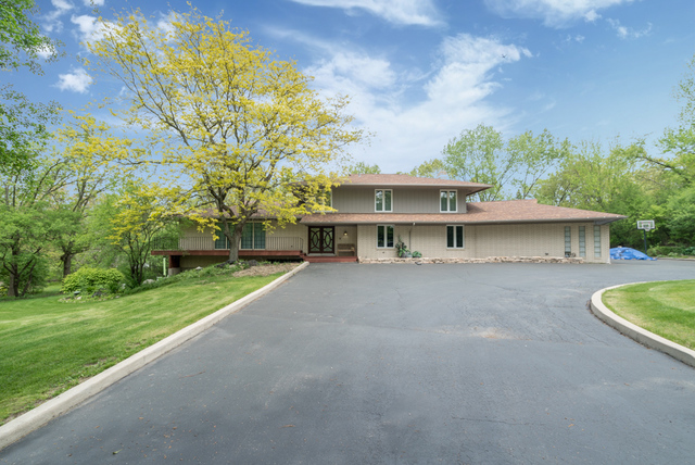 44 Old Creek Road Palos Park, IL 60464 - Photo 33 of 38 a view of a house with pool and a yard