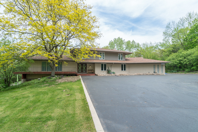 44 Old Creek Road Palos Park, IL 60464 - Photo 34 of 38 a front view of a house with a yard