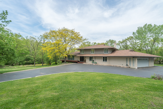 44 Old Creek Road Palos Park, IL 60464 - Photo 35 of 38 a view of a house with a yard
